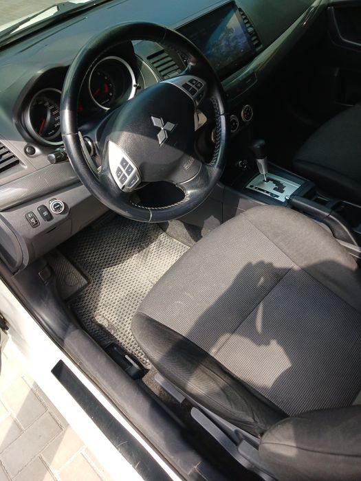 Mitsubishi Lancer 2009 VIN JMBLTCX3A9U002885 фото оголошення 6 з 18