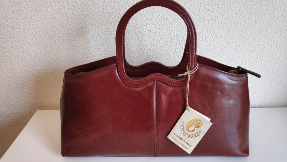 Mala em pele genuína NOVA