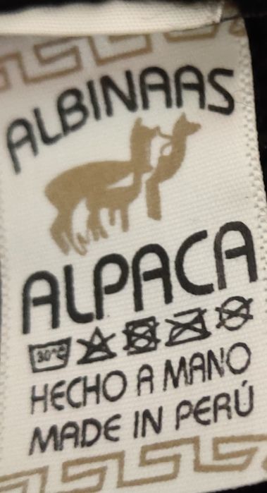 Casaco artesanal de lã de alpaca