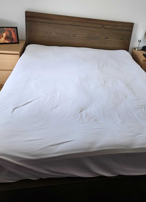 Cama com arrumação