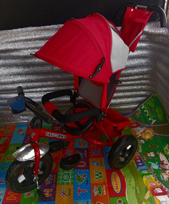 Продам детский музыкальный велосипед-коляска Lamber trike почти новый.