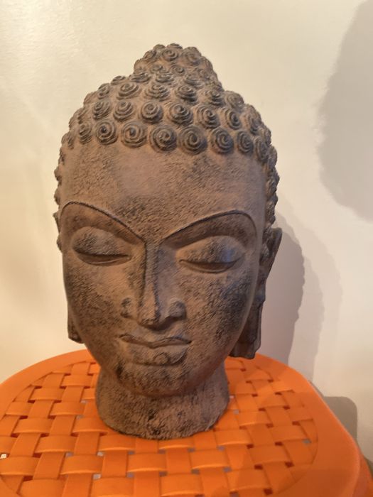 Cabeça de buda decorativa