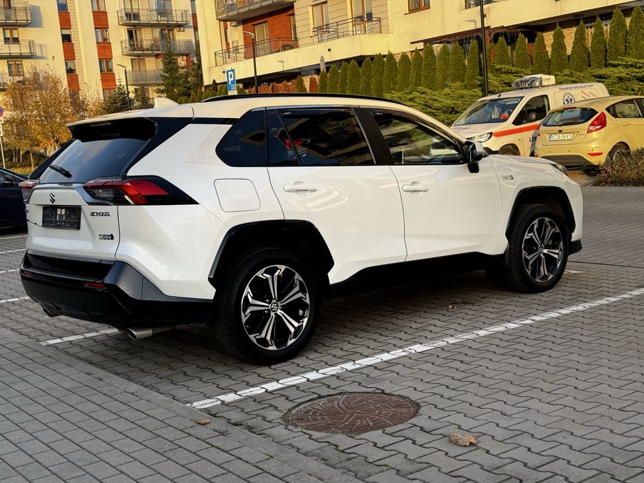 Suzuki -Toyota Rav 4