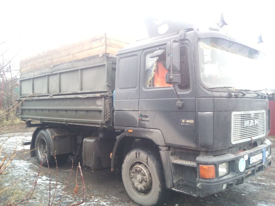 Ман самосвал з прицепом самосвалом