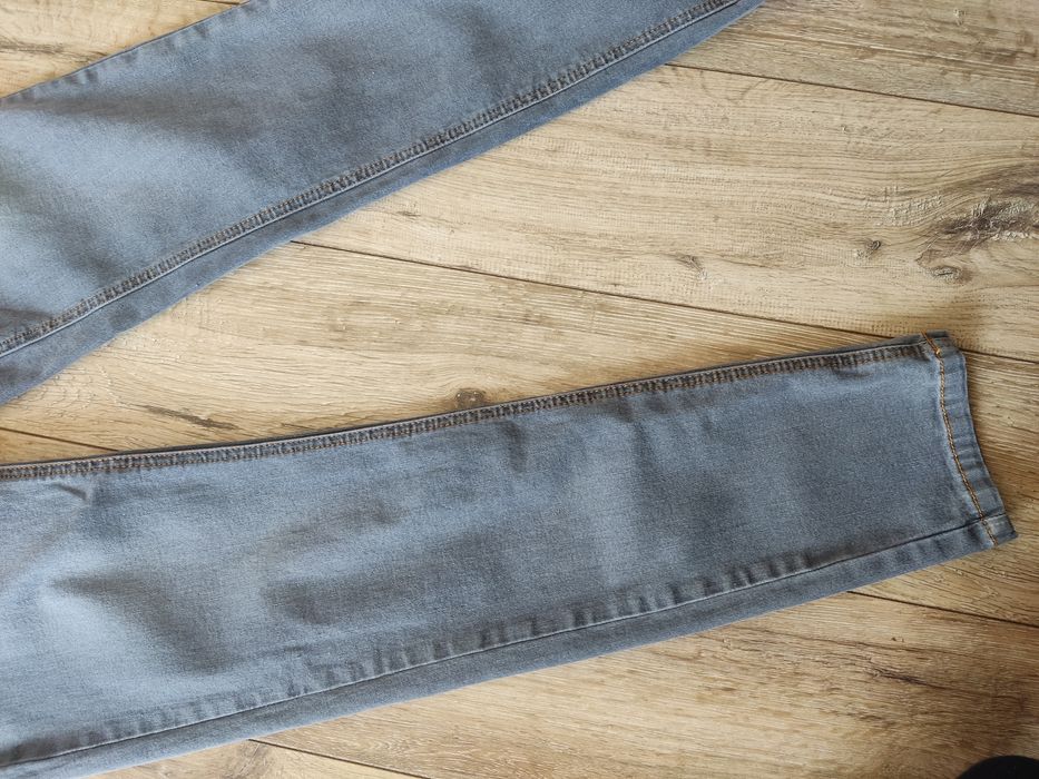 Jeansowe spodnie skinny rurki damskie ciążowe jasny dżins M 38