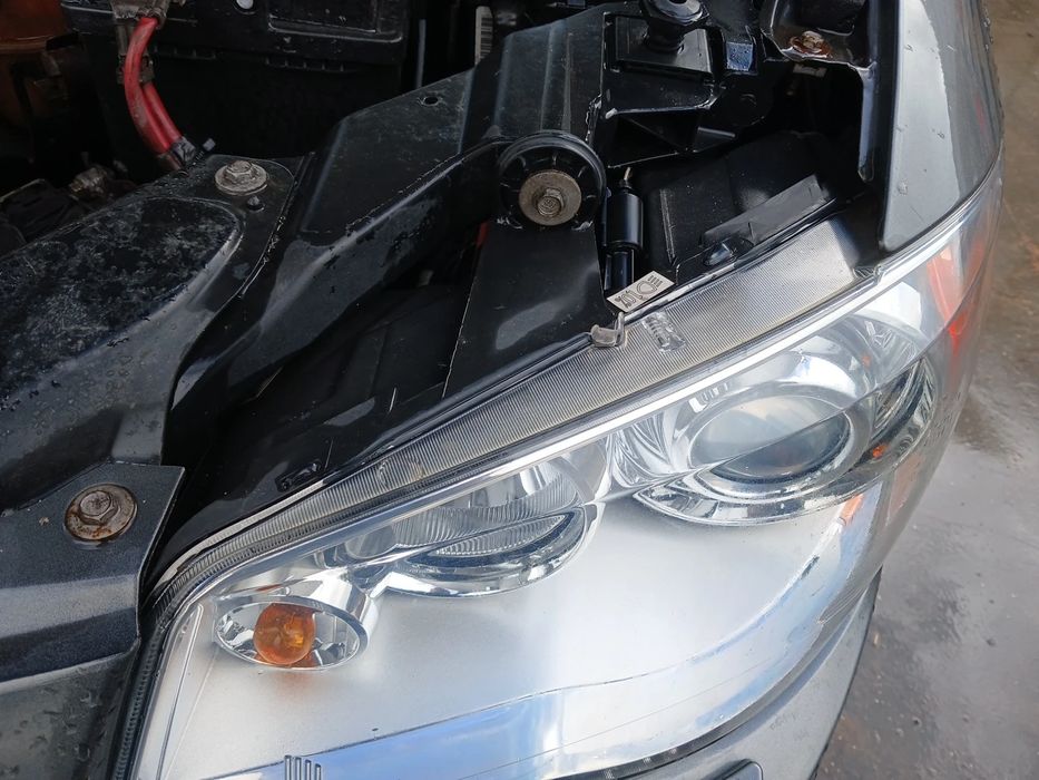 Ótica / farol esquerda CHRYSLER Grand Voyager V (RT)