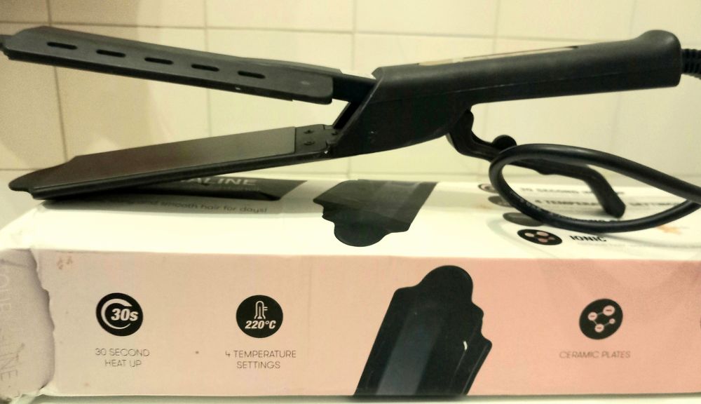 Placa alisamento com placas em cerâmica ainda  em caixa