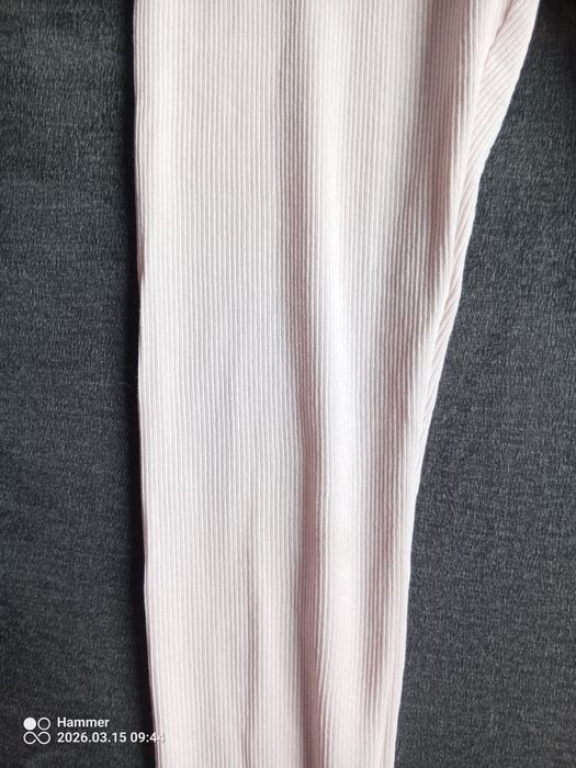 Pudrowe leginsy Sinsay 128 cm