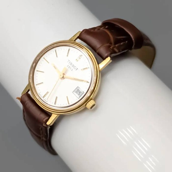 Relógio Tissot Damur em ouro 18 quilates; 13.55 gramas; 18.5cm