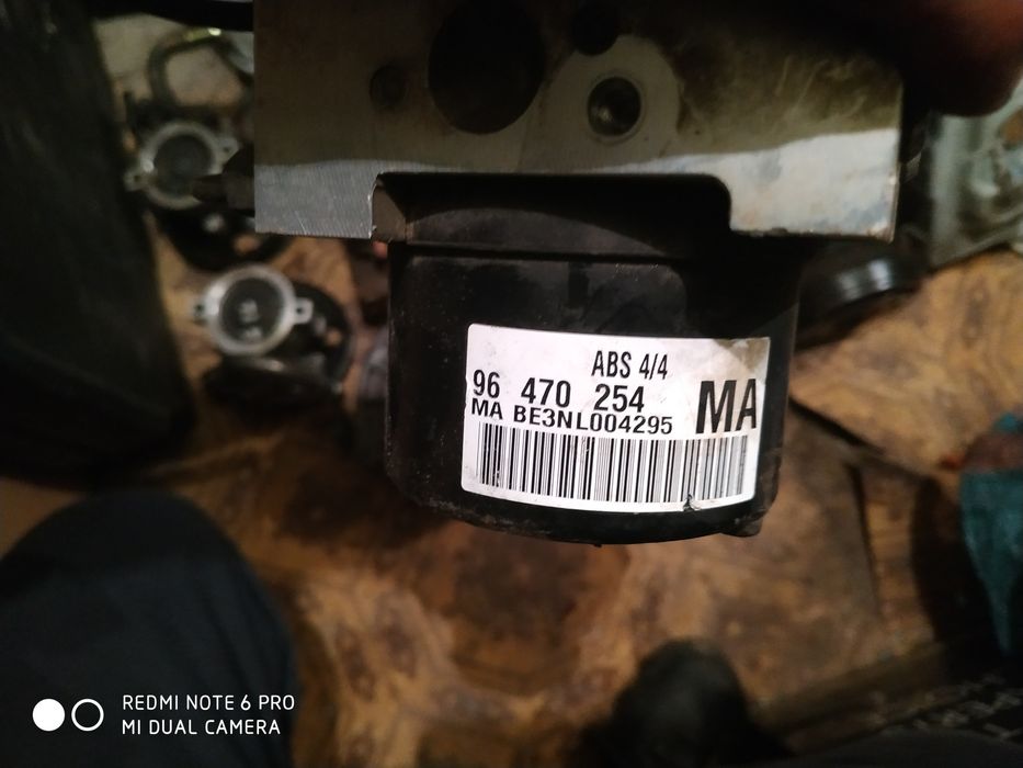 Chevrolet Aveo 04-11рік генератор 1.5