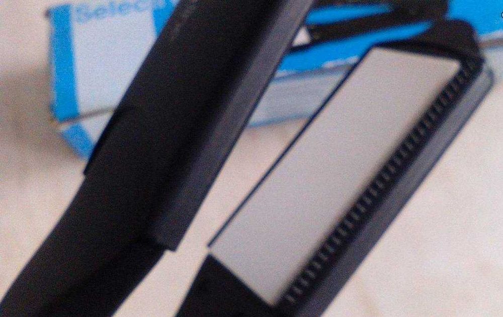 Alisador de cabelo como novo na caixa vendo ou troco