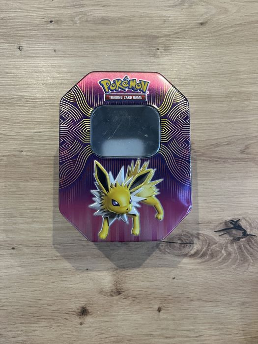 Oryginalna puszka Pokemon TCG Joltik - pusta!