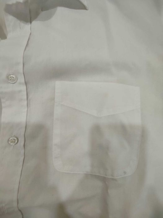 Camisa Branca  em excelente estado.