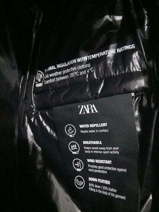 Casaco acolchoado preto com capuz