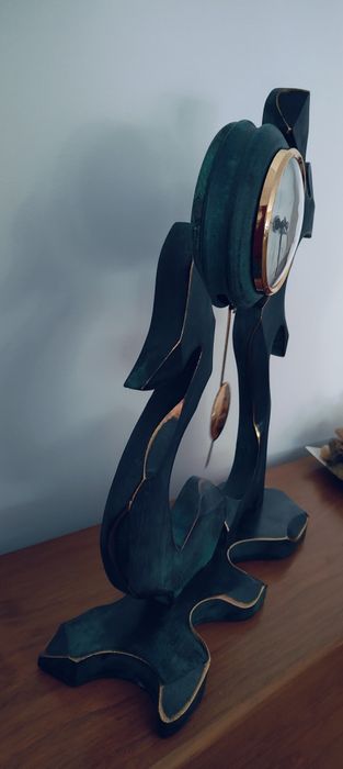 Relógio com pêndulo