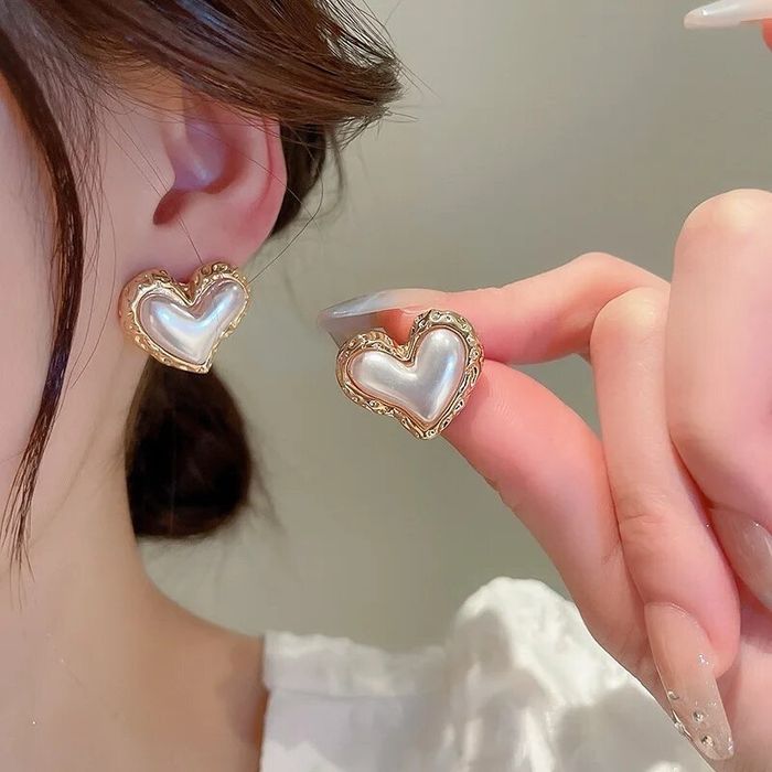 Сережки гвоздики серця срібні