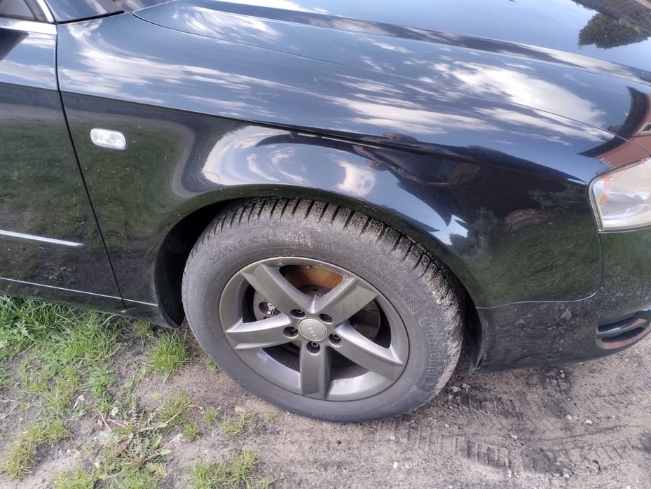 AUDI A4 B7 Błotnik prawy przód czarny LY9B w kolor lakier oryginał