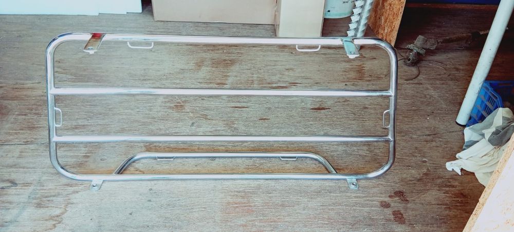 Suporte/grelha para mala