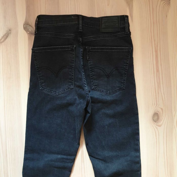 jeansy czarne levis