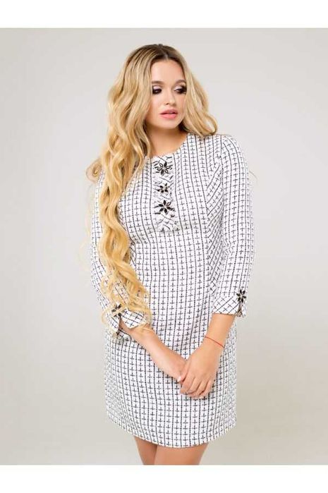 Жіноча сукня в клітинку