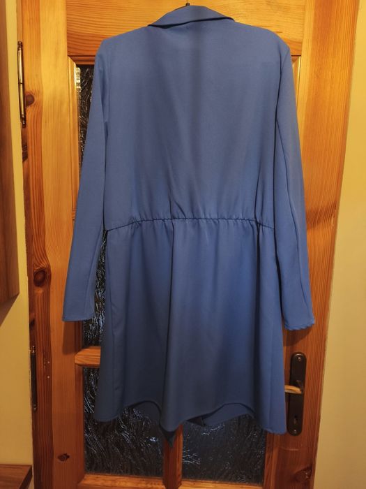 Elegancka sukienka Reserved.
