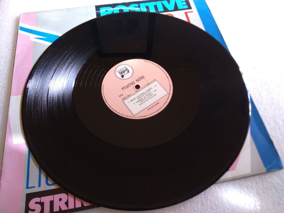 Álbum vinil Positive Noise ‎– When Lightning Strikes de 1983