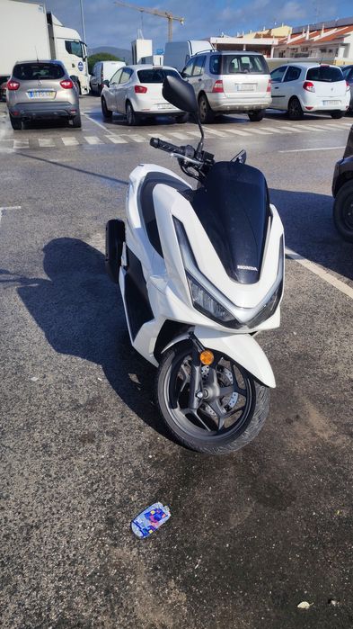 PCX 2025 - troco em carro
