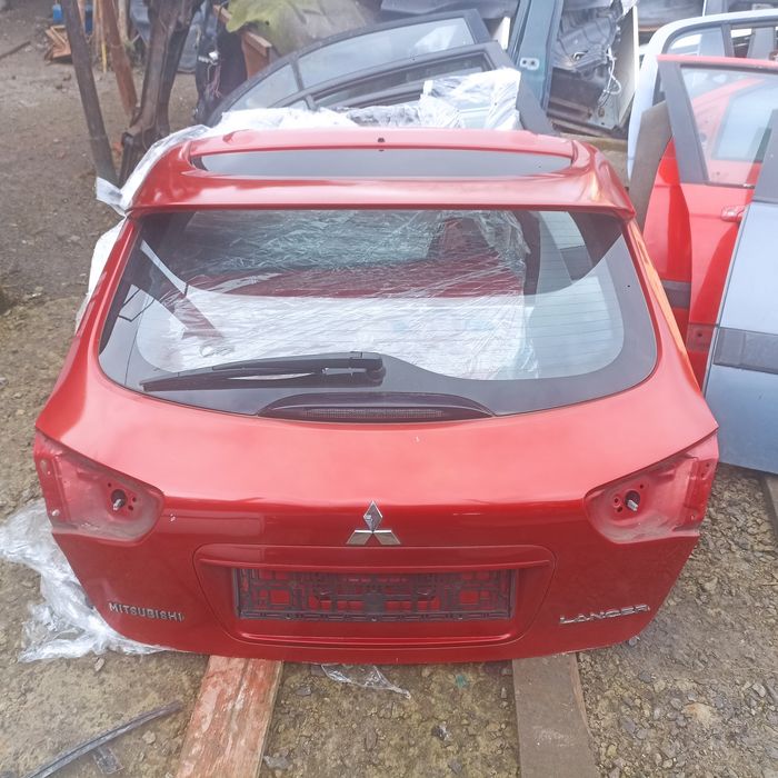 Кришка багажника мітсубісі ланцер 10 хетчбек