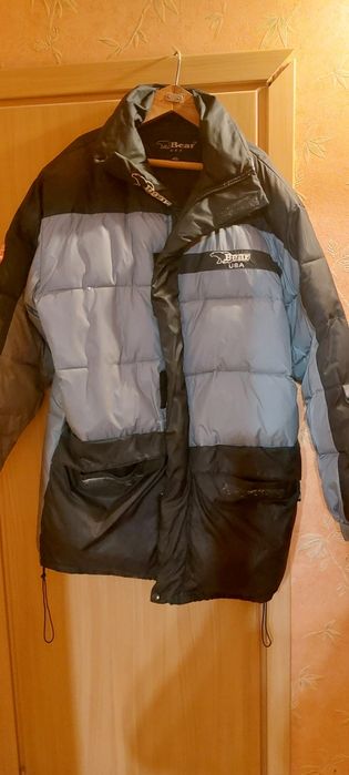 Зимова пухова куртка