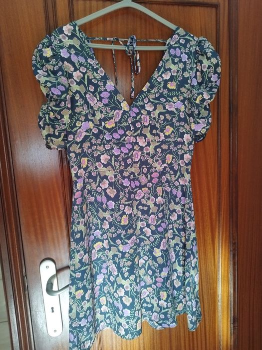 Vestido , blusa, calções  e casaco