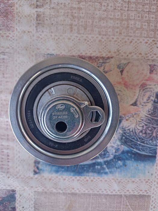 Натяжний Ролик ременя ГРМ групи ваг 1.6 тді