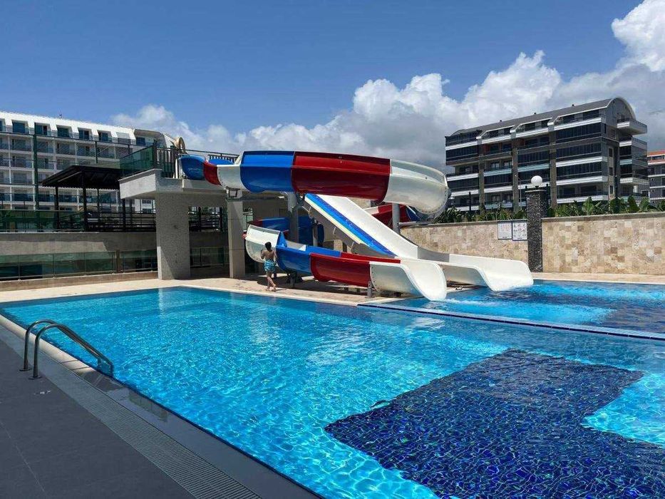 Квартира 55м2 Свой пляж и пирс! В жилом комплексе класса люкс Турция