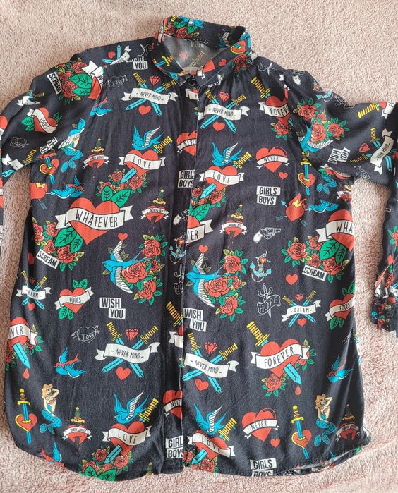 Koszula we wzory  tattoo serca, róże..
Mohito roz 34
Dobra od xs do m