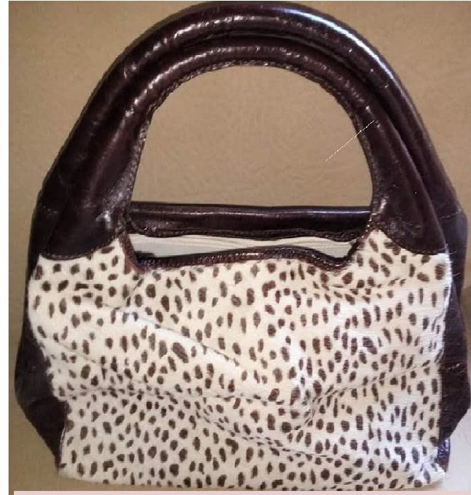 Mala em pele genuína