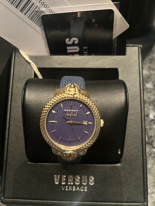 Piekny zegarek Versace Versus -zlote medyzy