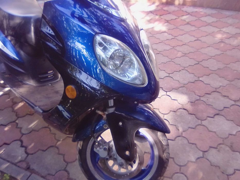 Скутер 150  кубических сантиметров