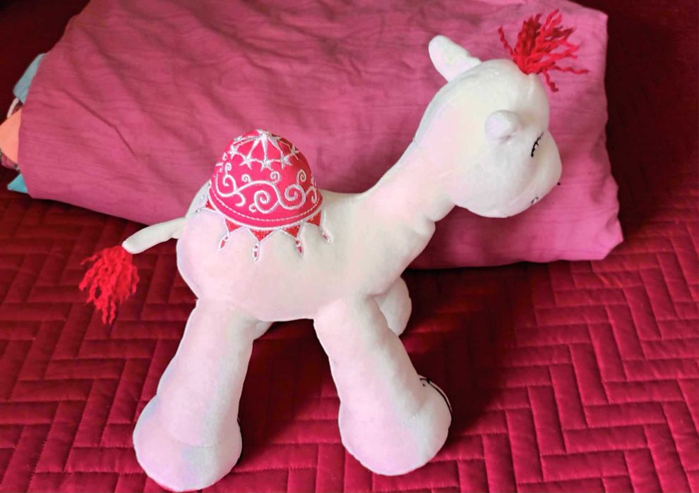 Peluche dromedário branco