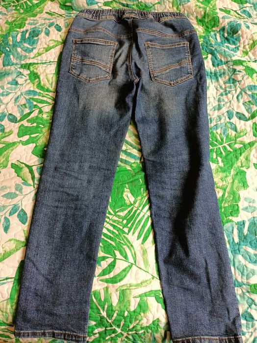 Jeansy chłopak Reserved 152