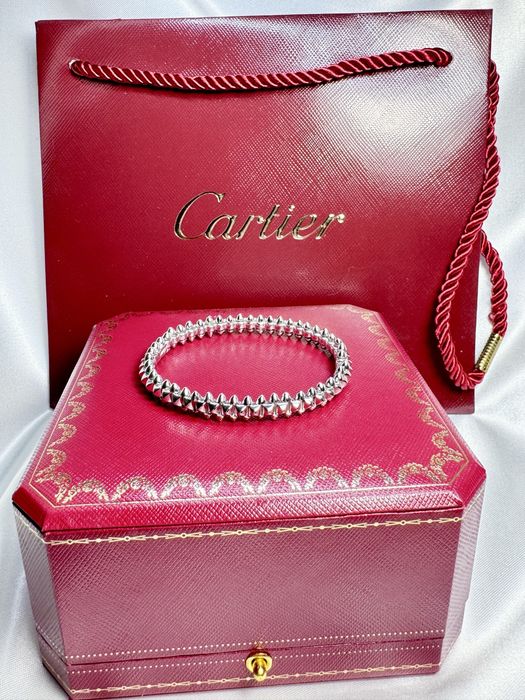 Золотий браслет у стилі Cartier
