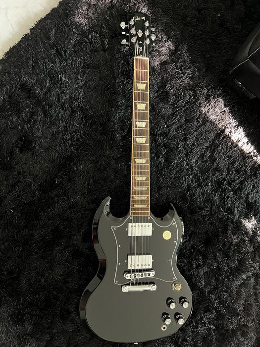 Gibson SG Standard Ebony + Afinador + Peavy R60