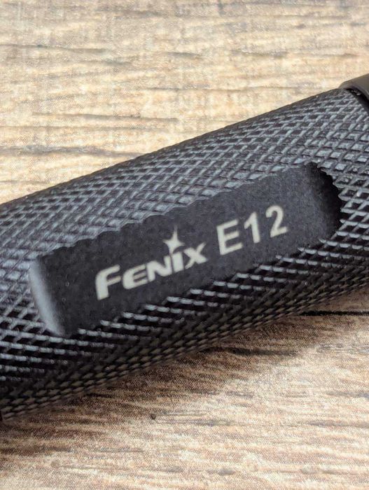 Фонарь Fenix E12 (Cree XP-E2, 130 люмен, 3 режима, 1xAA)