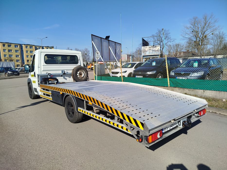 Transport pojazdów / towarów Autolaweta Pomoc drogowa