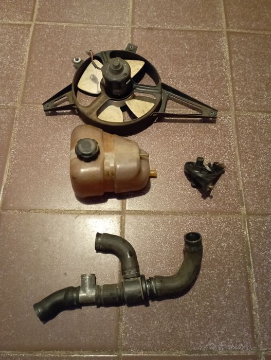 Вентилятор двигуна та кран пєчки ЗАЗ Славута