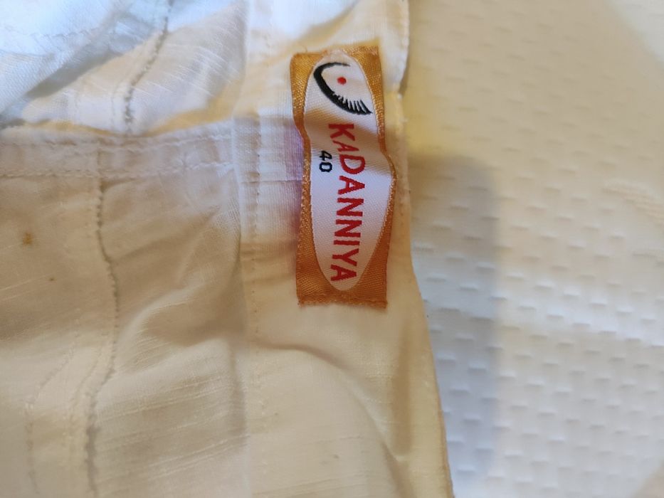 Жіночі блузки б/у  44 розміру- блузка+спідниця або блузка+штани