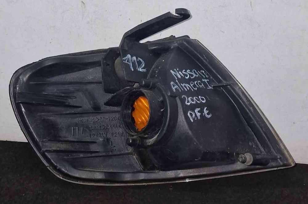 Pisca Frente Esquerdo - NISSAN ALMERA I