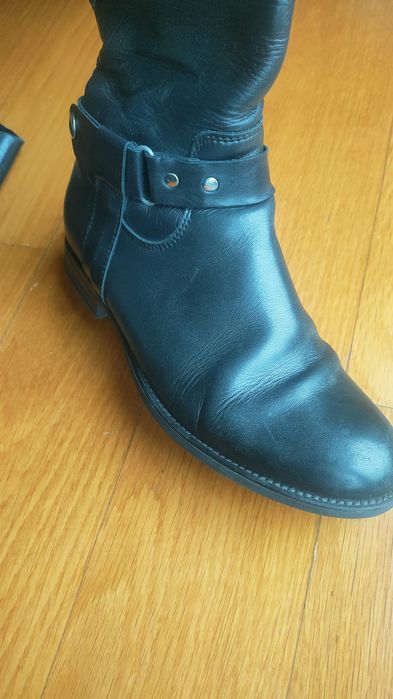 Botas cano alto. Pele