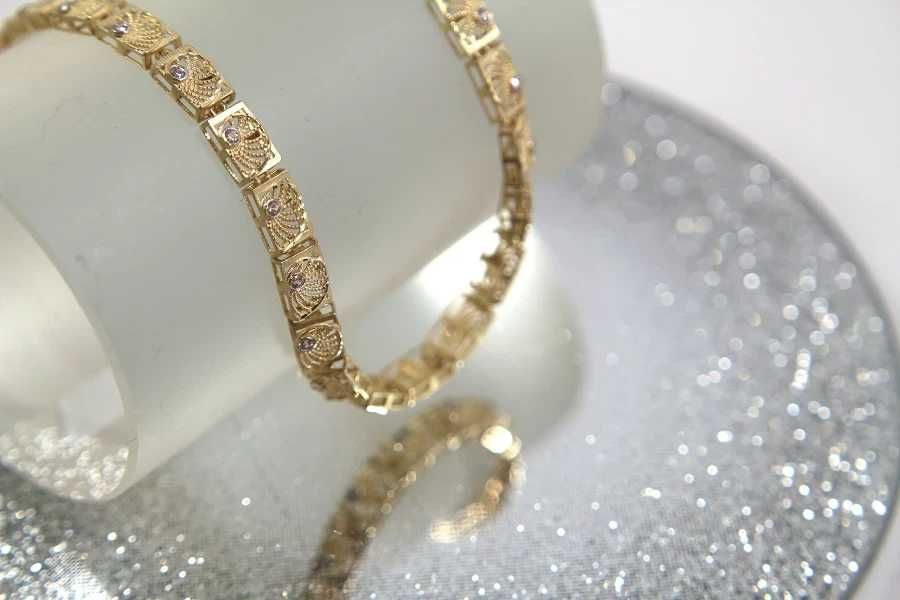 Złota ażurowa bransoletka z cyrkoniami p:585 w:5,38g r:17,5-19,5cm