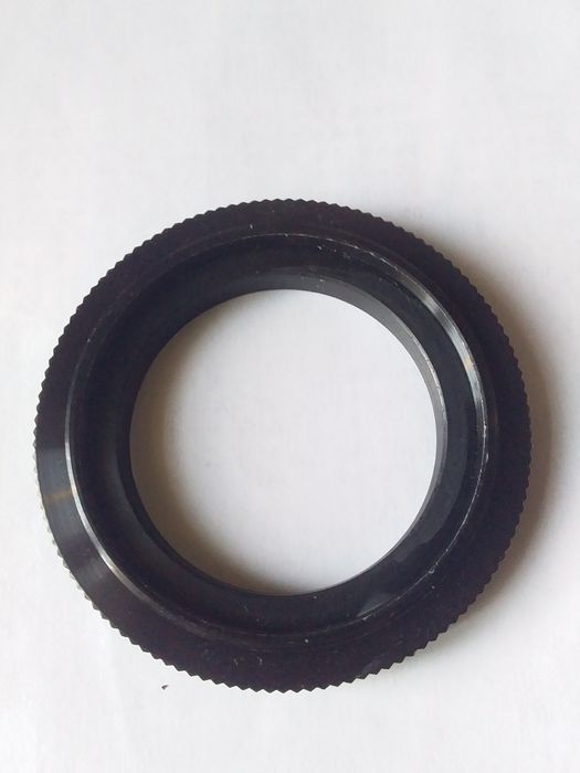 Кольцо для крепления фотообьективов.