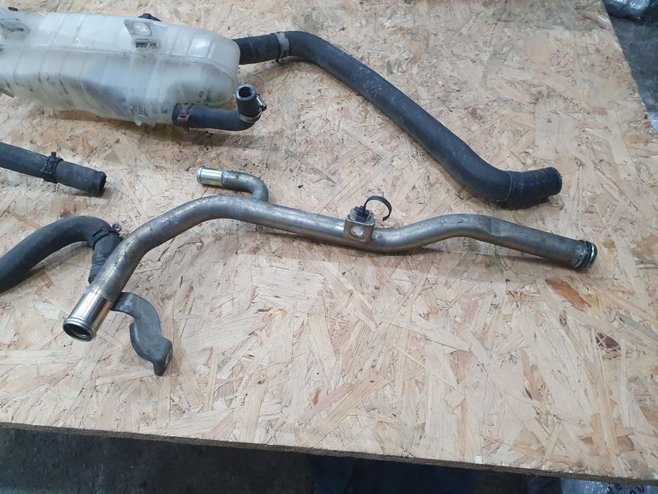 Magistrala króciec zbiorniczek wąż wodny Nissan Micra k12 1.2 04r