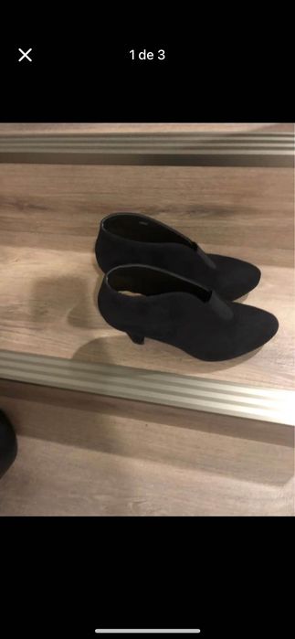 Botins pretos, em perfeito estado.